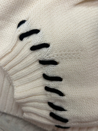 Horseshoe Knit Sweater shown from a side angle to display the knit texture and sole