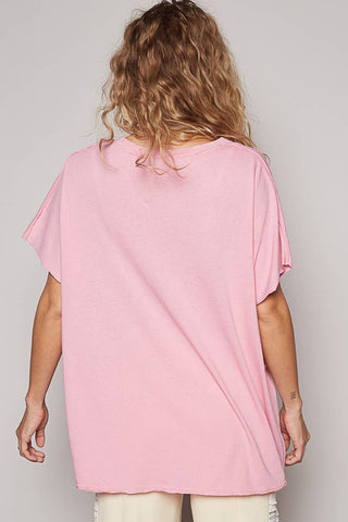 Oversized V-Neck Tee laid flat or shown on a model, highlighting its boho fabric and neckline