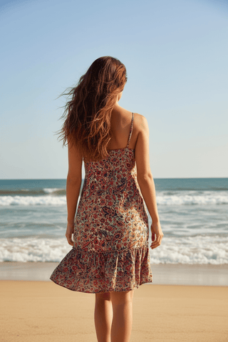 Paisley Silky Mini Dress shown on a hanger or flat lay, highlighting its silky silhouette