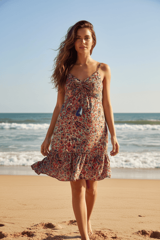 Paisley Silky Mini Dress shown on a hanger or flat lay, highlighting its silky silhouette