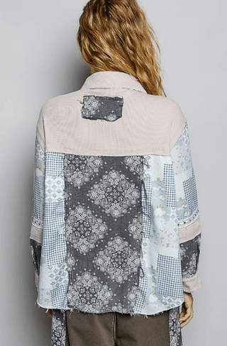 Patchwork Button-Down Shirt Jacket shown on a hanger or flat lay, highlighting its patchwork texture