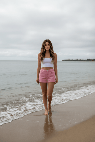 Pink 5-Pocket Denim Shorts laid flat, showing the denim texture and fit
