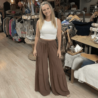 Ribbed Boat Neck Cropped Tank Top laid flat or shown on a model, highlighting its ribbed fabric and neckline
