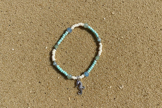 Seahorse Bracelet laid flat, showing its coastal-inspired charm and clasp