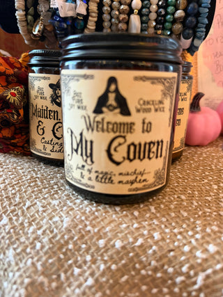 Seasonal Wood Wick Soy Candles in a glass jar with a visible wood wick, styled with seasonal decor