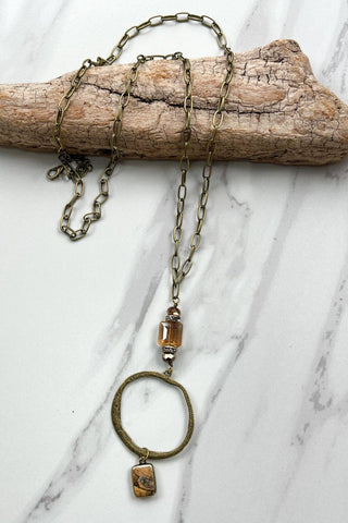 Sicily Necklace laid flat, highlighting its pendant design