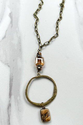 Sicily Necklace laid flat, highlighting its pendant design