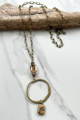 Sicily Necklace laid flat, highlighting its pendant design