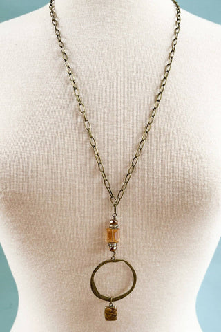 Sicily Necklace laid flat, highlighting its pendant design