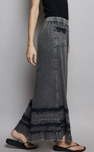Smoke Show Ruffle Pants shown flat, highlighting the relaxed fit