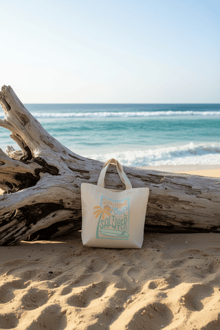 Sun + Salt + Surf Canvas Mini Tote shown from the front, highlighting its canvas finish and hardware