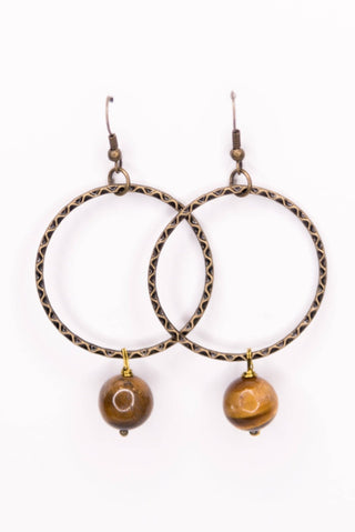 Close-up of Tiger's Eye Earrings dangle earrings laid flat, showing their tiger's eye detail