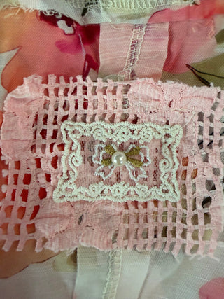 Vintage Lace Patchwork Top laid flat or shown on a model, highlighting its patchwork fabric and neckline