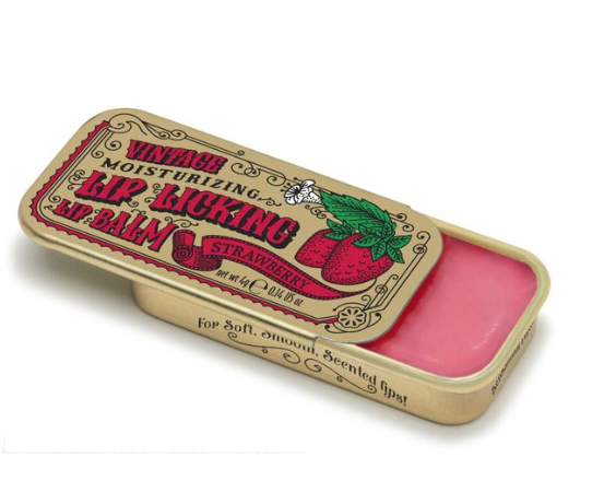 lip gloss in vintage looking tin strawberry flavor